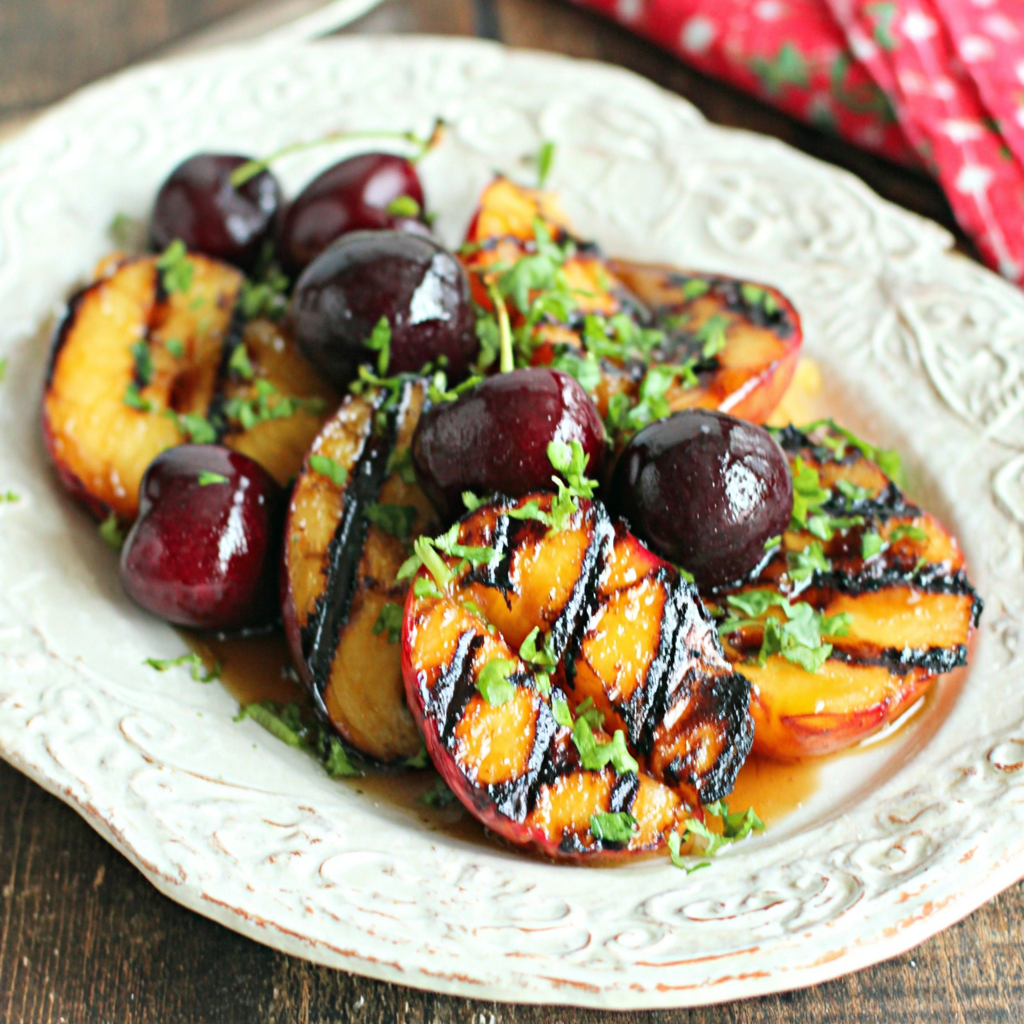 Grilled Peaches and Cherries with Cinnamon-Honey Syrup